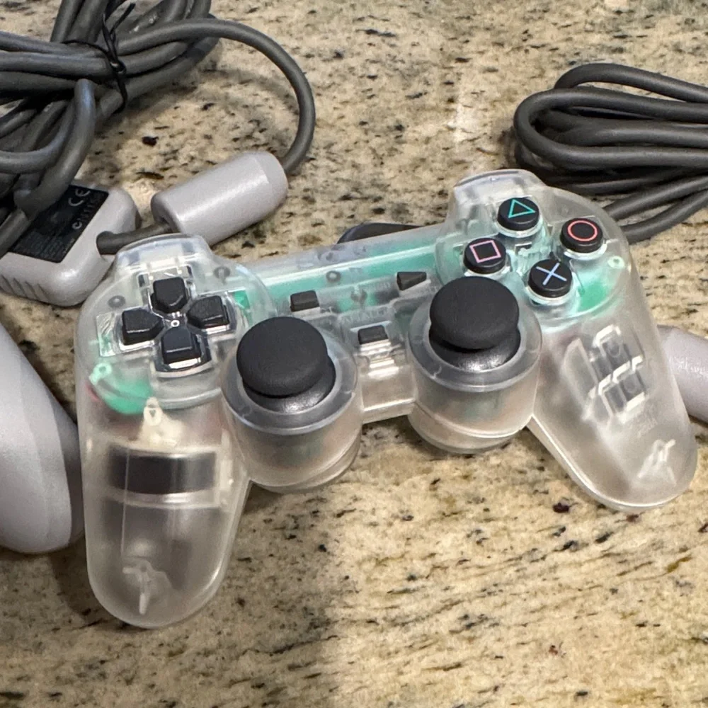 Set of 2 Sony DualShock Controllers in Gray and Transparent